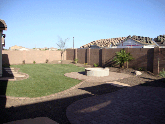 Tropical Landscape with Paver Entertainment Area and Firepit