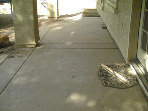old concrete before new paver patio remodel